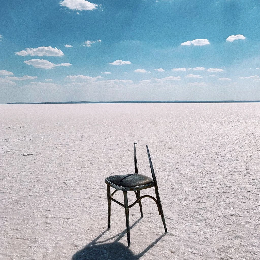 A salt flat mirroring a twilight sky, from the Salt & Sky collection